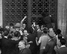 An Angry Mob Attacking a Fascist Building, 1944. Creator: British Pathe Ltd.