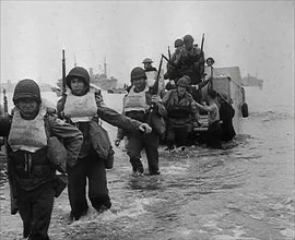 American Troops Walking Onto a North African Beach as Part of 'Operation Torch’, 1942. Creator: British Pathe Ltd.