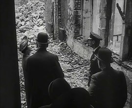 King George VI and Queen Elizabeth Inspecting Bomb Damage, 1942. Creator: British Pathe Ltd.