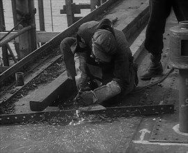 A Factory Worker Constructing Part of a Ship, 1943. Creator: British Pathe Ltd.