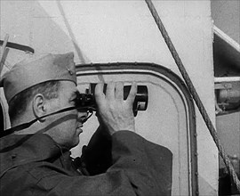 A Sailor Using Binoculars, 1943. Creator: British Pathe Ltd.