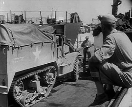 A Supply Truck Backing Into a Supply Depot, 1943. Creator: British Pathe Ltd.