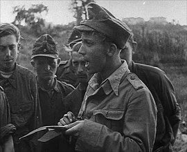 A German Prisoner of War Writing Details Down, 1943-1944. Creator: British Pathe Ltd.