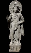 Standing Bodhisattva, Shahbaz-Garhi, Pakistan, 1st-3rd century. Creator: Buddhist art ().