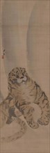 Part of a diptych depicting a quietly crouched tiger, 1820. Creator: Gessho; Cho (1772-1832).