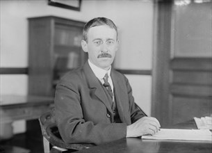 H.L. Stimson at desk writing, 1910. Creator: Bain News Service.