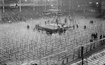 Arranging Madison Square Garden for Frank Moran and Jess Willard fight, 1916.  Creator: Bain News Service.