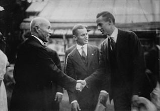 Count Okuma welcomes Paul Des Jardien of Chicago baseball team, 11/18/15, 1915. Creator: Bain News Service.