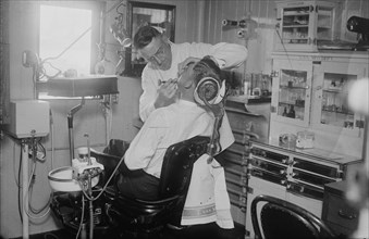 Dentist on COMFORT, between c1915 and c1920. Creator: Bain News Service.