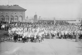 Raising N.Y.City's flag, 1916. Creator: Bain News Service.