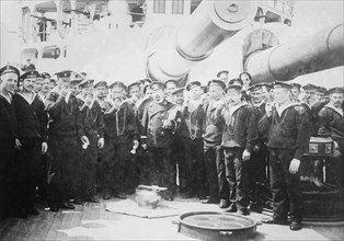 Serving grog on Russian Battleship, between c1910 and c1915. Creator: Bain News Service.