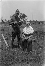 Signal Corps barber, between c1915 and c1920. Creator: Bain News Service.