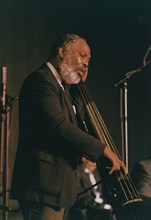 Cleveland Eaton, Count Basie Orchestra, Northampton, England, 1989. Creator: Brian Foskett.