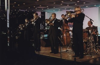 Bob Brookmeyer, Jimmy Knepper and Slide Hampton, Jazz Inn Party, Nordwijk, Netherlands, 1989. Creator: Brian Foskett.