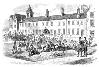 Sketches from Ireland: troops in the yard of the Poorhouse at Kells, 1870. Creator: Unknown.