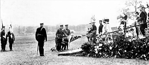 The Royal Review...in Worsley Park:...the King touching the staffs..., 1909. Creator: Topical Press Agency.