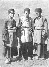 Threateners of Teheran: men who may capture the Shah - three young Bakhtiaris, 1909. Creator: Unknown.