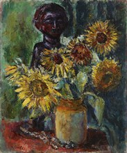 Sun Flowers and a Wooden Sculpture, 1885-1943. Creator: Meri Genetz.