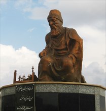 Statue of Rashid al-Din (1247-1318) in Hamadan, Iran. Creator: Anonymous.