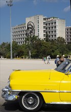 American Cadillac in front of a government building, Plaza de la Revolucion, Havana, Cuba, 2024. Creator: Ethel Davies.