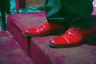 The shiny red shoes of one of the performers from Buena Vista Social Club, Havana, Cuba, 2024. Creator: Ethel Davies.