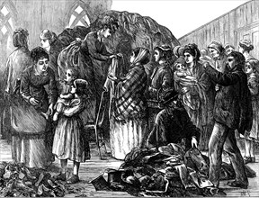 The Chicago Fire: Ladies of Chicago supplying the refugees with clothing, 1871. Creator: Unknown.