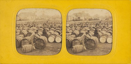 Men rolling a barrel in a field of barrels, 1860s. Creator: E Lamy.