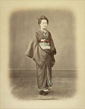 Woman in Traditional Dress, about 1868. Creator: Felice Beato.