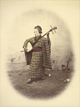 Street Singing Girl, 1866-1867. Creator: Felice Beato.