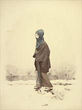 Woman in Winter Dress, 1866-1867. Creator: Felice Beato.