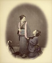 Putting on the Obi, or Gridle, 1866-1867. Creator: Felice Beato.