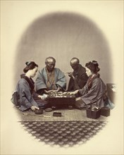 Japanese Playing Goobun, 1866-1867. Creator: Felice Beato.