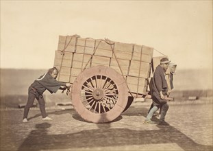 Men pushing a Wagon, about 1868. Creator: Felice Beato.