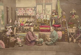 Two Japanese business men in their shop, 1868-1880. Creator: Felice Beato.