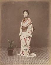 Woman with Potted Plant, 1870s-1890s. Creator: Kusakabe Kimbei.