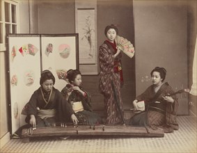 Playing with Music, 1870s-1890s. Creator: Kusakabe Kimbei.