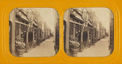 Angled view of a row of shops, about 1860. Creator: Unknown.