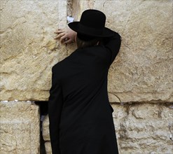 A Jew praying at the Western Wall, Jerusalem, Israel, 2013.  Creator: LTL.