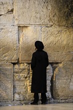 A Jew praying at the Western Wall, Jerusalem, Israel, 2013.  Creator: LTL.