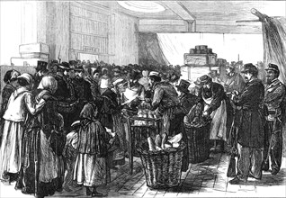 Relief of Paris: distribution of the English gift at the Magasin du Bon Marché, rue de Sèvres, 1871. Creator: Unknown.