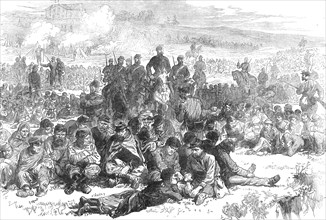 The Late Events in Paris: captive insurgents of Belleville guarded in the Parc des Buttes..., 1871. Creator: Unknown.