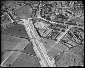 Hazelhurst Cotton Mill and the East Lancashire Road (A580)  under construction, Hazelhurst, c1930s. Creator: Arthur William Hobart.