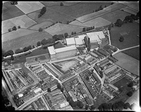 Sutton Worsted Mills on Bridge Street, Sutton-in-Craven, North Yorkshire, c1930s. Creator: Arthur William Hobart.