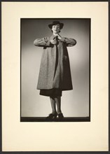 Woman modeling a coat, early 1940s. Creator: Gunther Krampf.