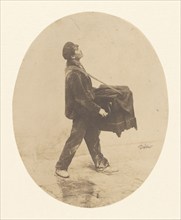 The Organ Grinder, about 1853. Creator: Andre-Adolphe-Eugene Disderi.