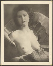 Portrait (Female Nude Draped in Folded Fan-Like Paper), about 1920. Creator: Arthur J Kales.