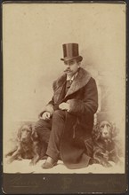 Portrait of a Moustachioed Seated Man in Top Hat and Winter, Fur-Collared Coat..., about 1890. Creator: Lewis Peavey.