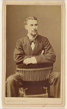 Unidentified man with Vandyke beard, seated, 1865-1870. Creator: Bertall et Cie.