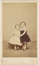 Two little girls embracing, 1865-1875. Creator: A. Crowe.