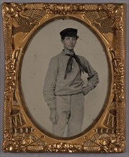 Portrait of a Young man wearing a cap and scarf, standing, about 1860. Creator: Unknown.